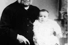 Rev. Cary and child. Not sure if it's son or daughter?