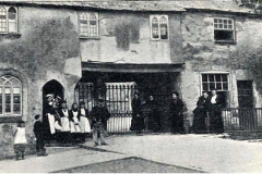 Church gate medieval houses circa 1890.