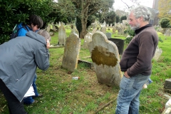 Sheila, Nina and Paul attempting to read inscriptions.