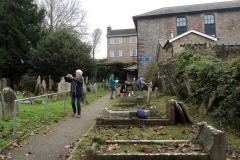 Photographing the grave yard note old 'Workhouse' in background.